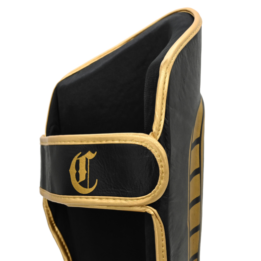 Ochraniacze na goleń i stopę skórzane Cohortes "Aculeo Armis" black/gold