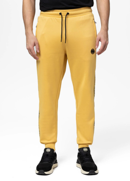 Spodnie dresowe PIT BULL "TAPE LOGO" - żółty