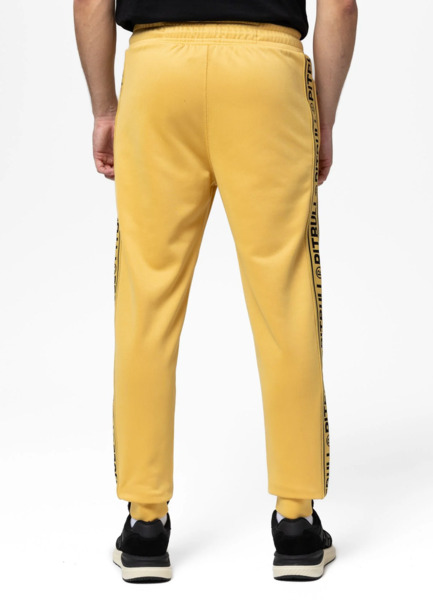 Spodnie dresowe PIT BULL "TAPE LOGO" - żółty