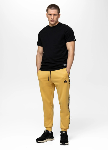 Spodnie dresowe PIT BULL "TAPE LOGO" - żółty