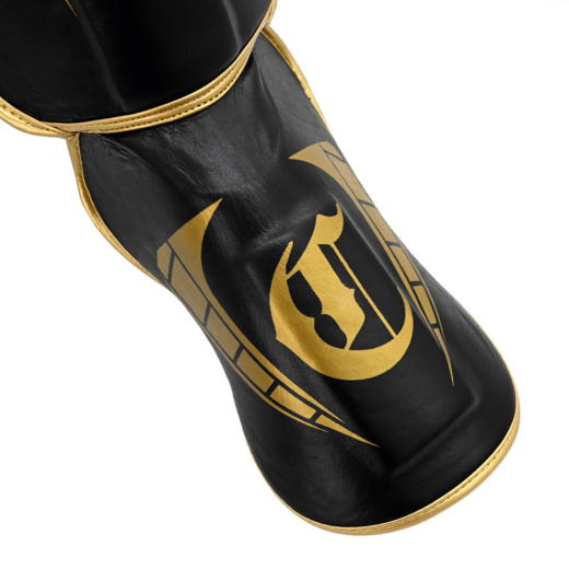 Ochraniacze na goleń i stopę skórzane Cohortes "Aculeo Armis" black/gold